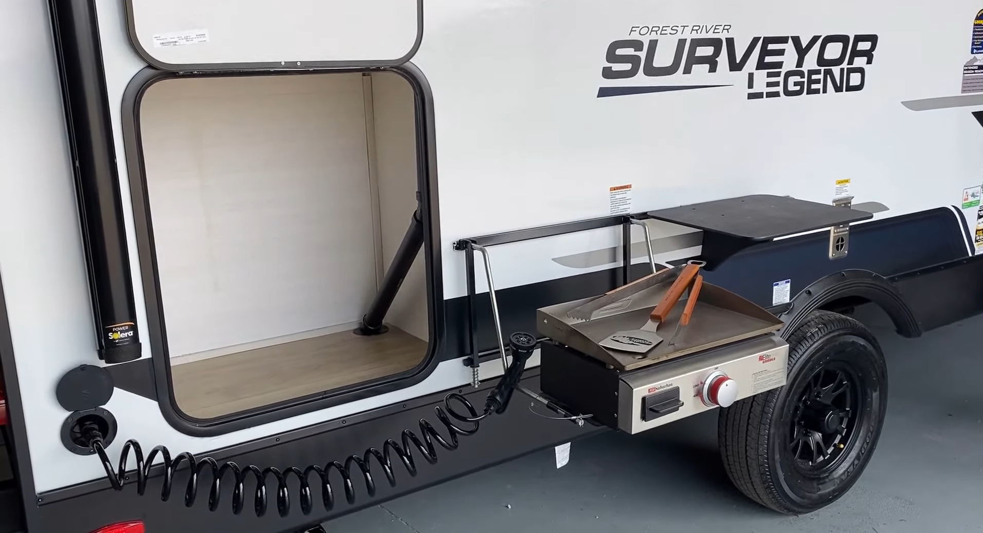 Surveyor 19SSLE Exterior Cooking station and goodyear tires